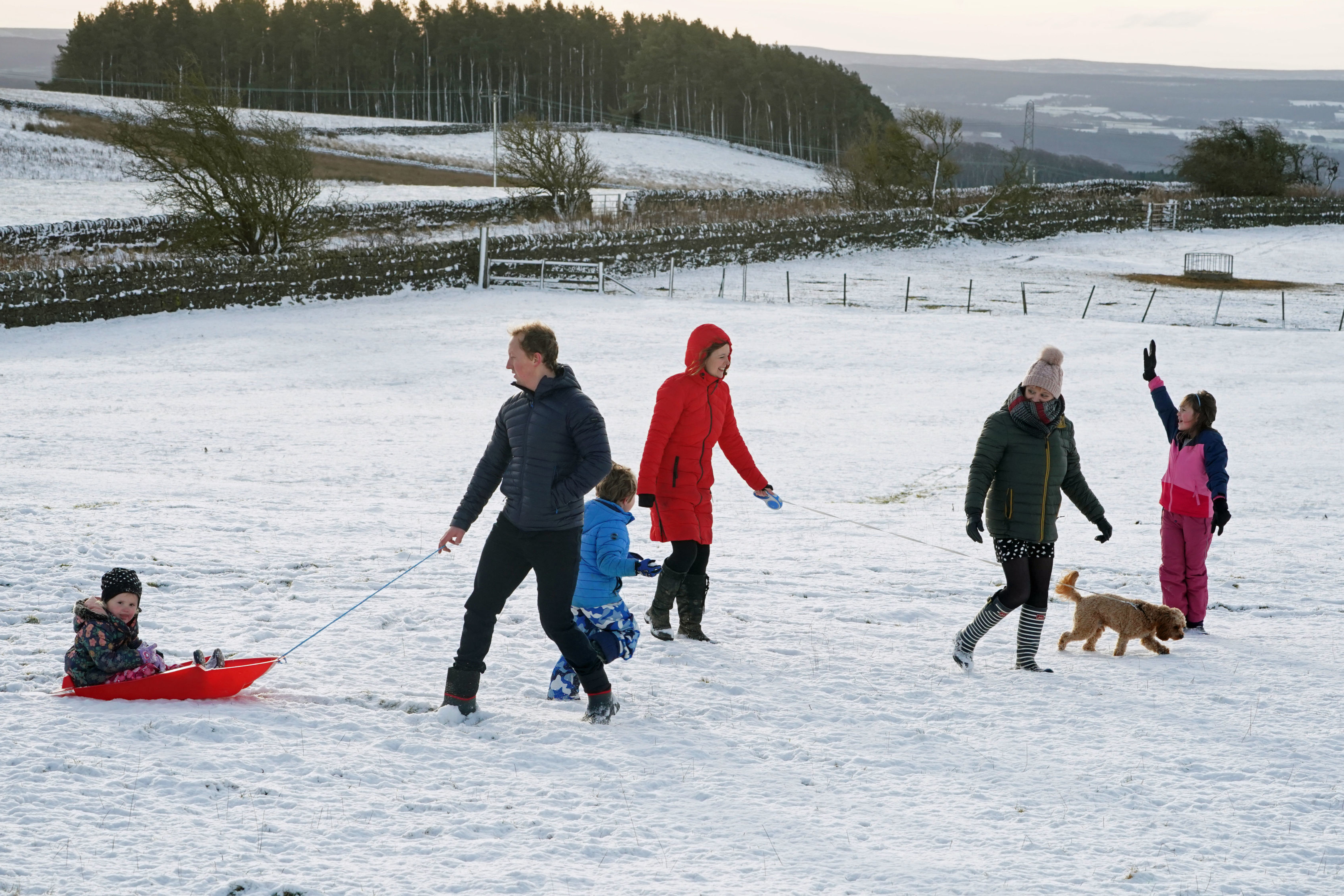 It’s a White Christmas as snow falls in UK