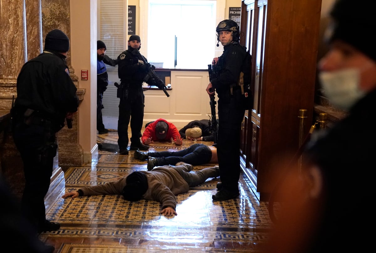 Trump supporters storm US Capitol as Joe Biden condemns ‘dark moment’ for democracy