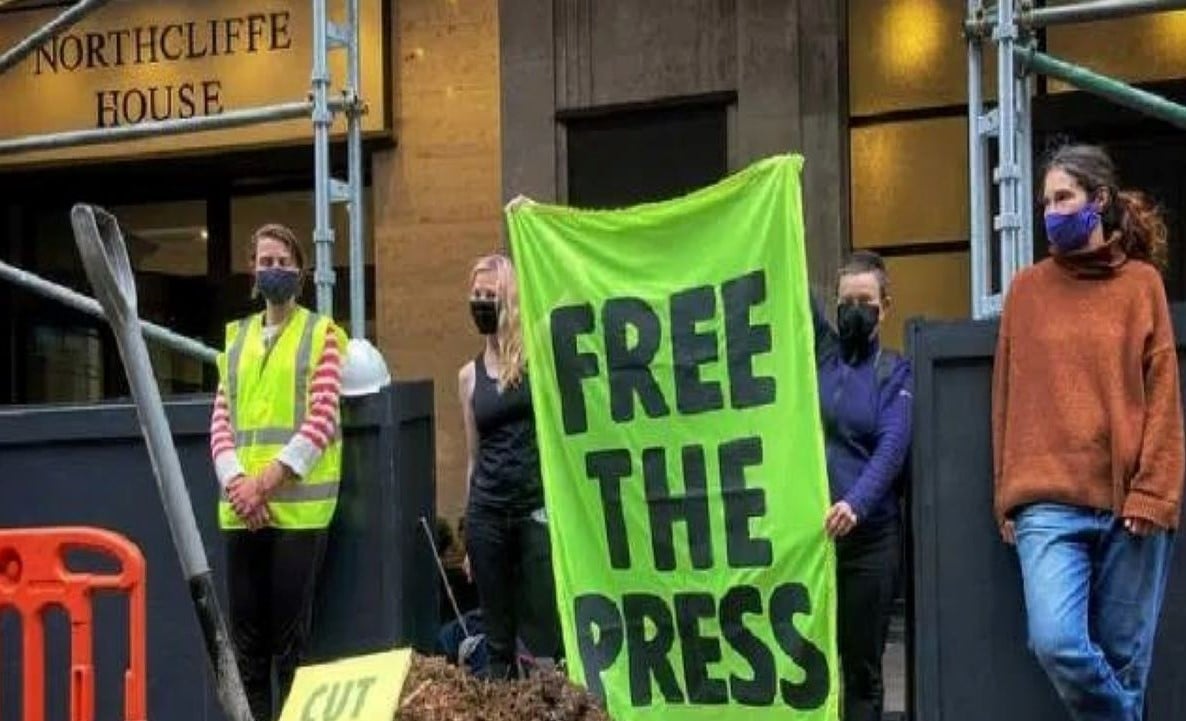 Police arrest 6 after manure dumped outside London newspaper offices