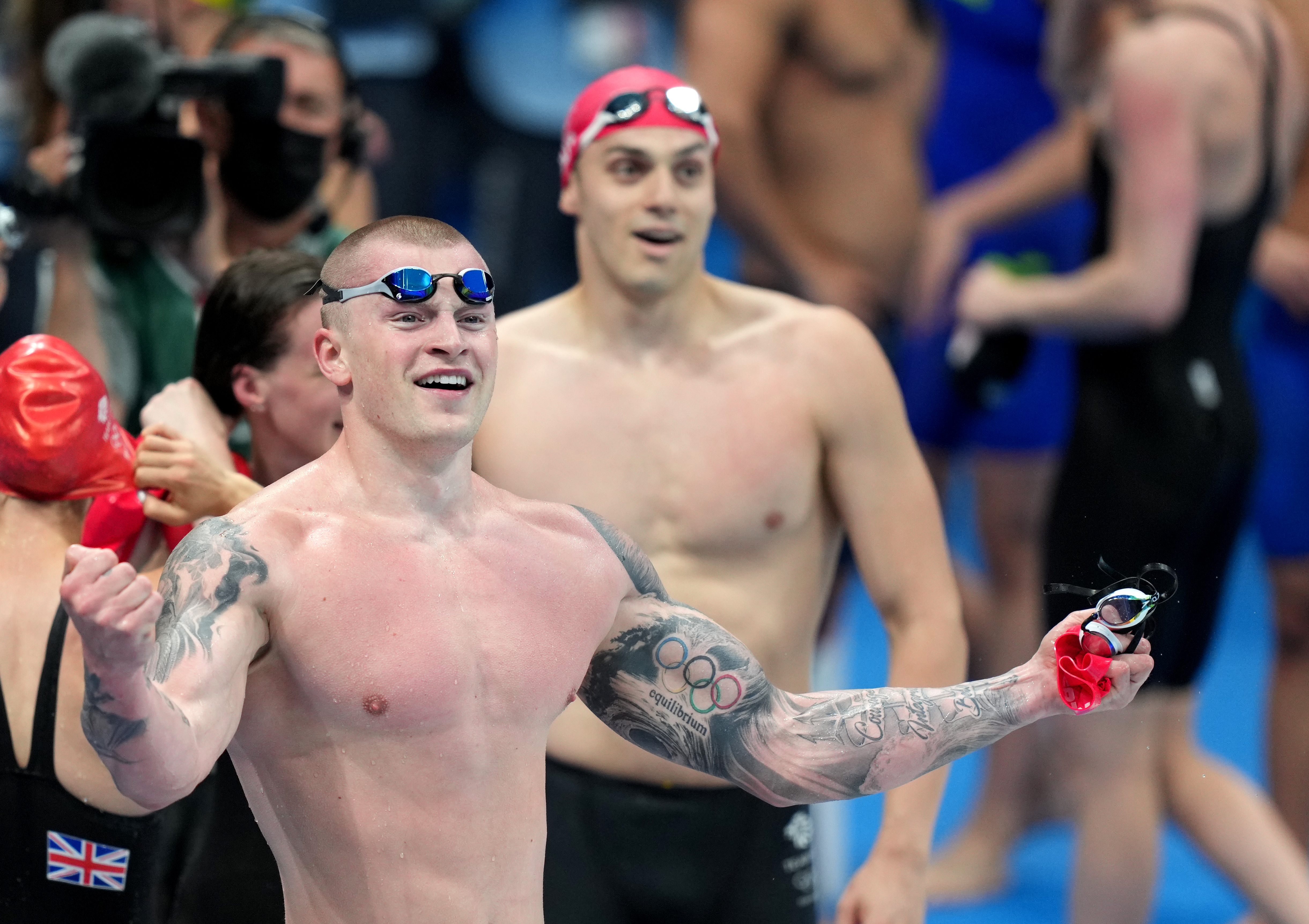 Team effort as GB quartets grab golds in swimming and triathlon relays