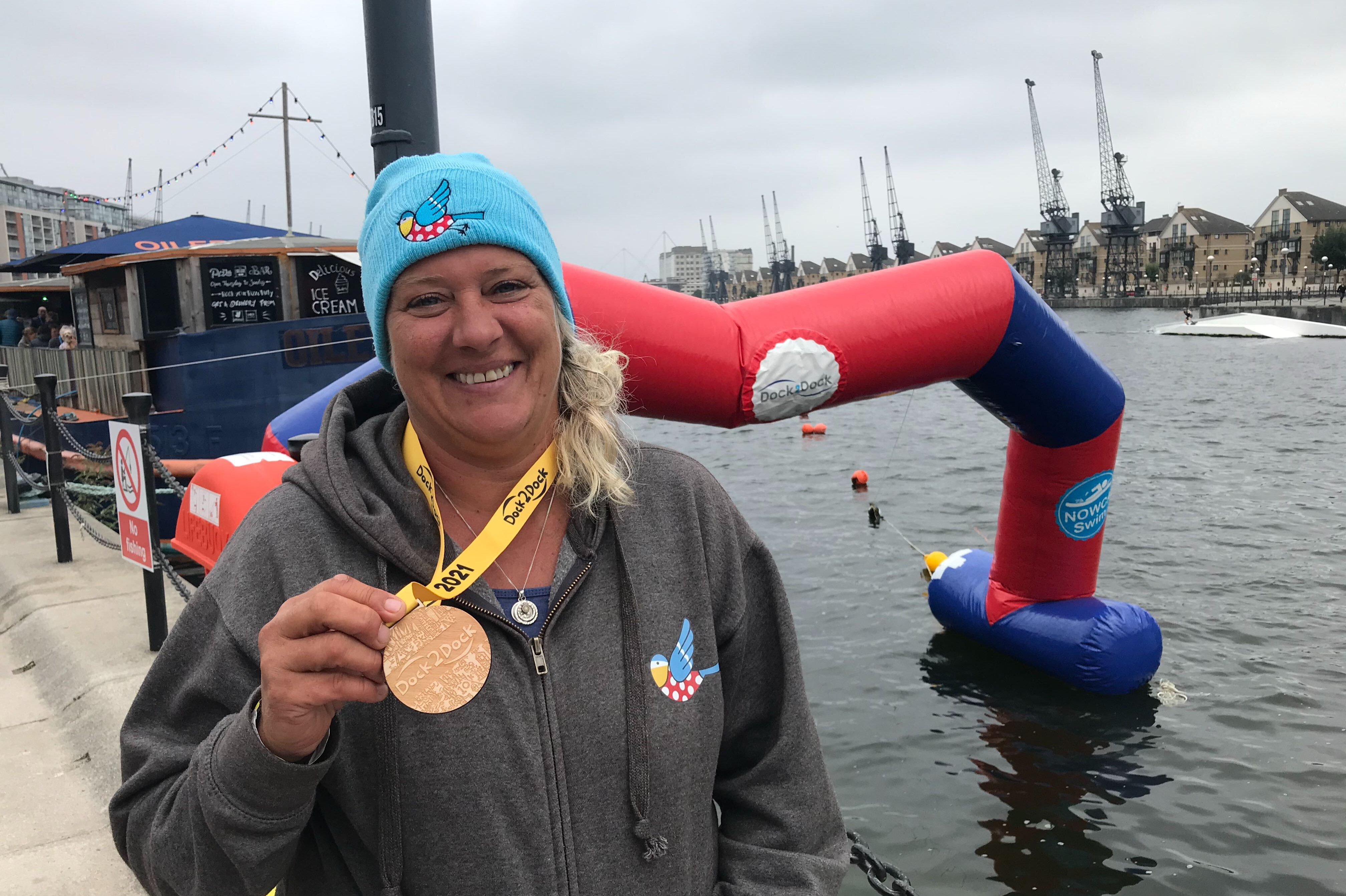 Londoners celebrate 15km open water swim at Royal Docks