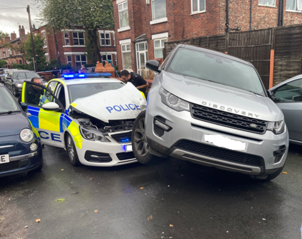 Police car rammed by Land Rover during chase