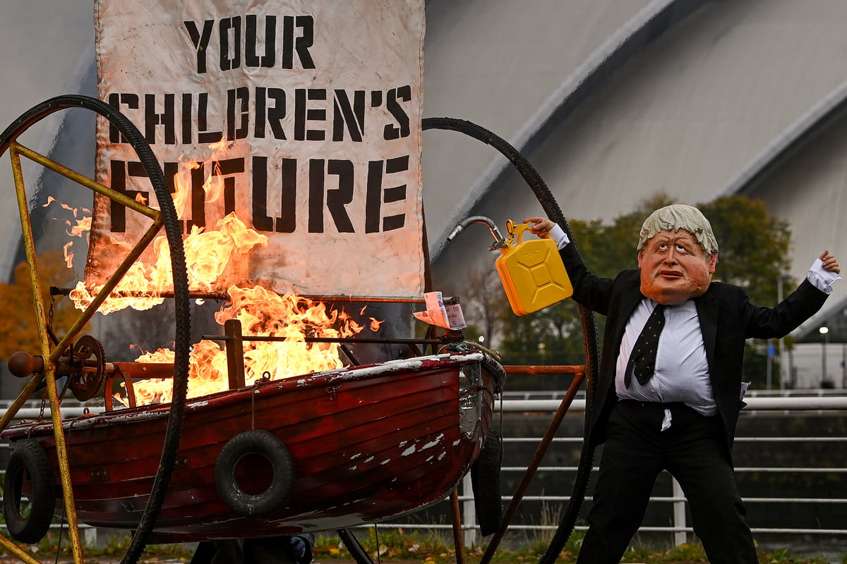 Ocean Rebellion activist dresses up as Boris Johnson ahead of COP26