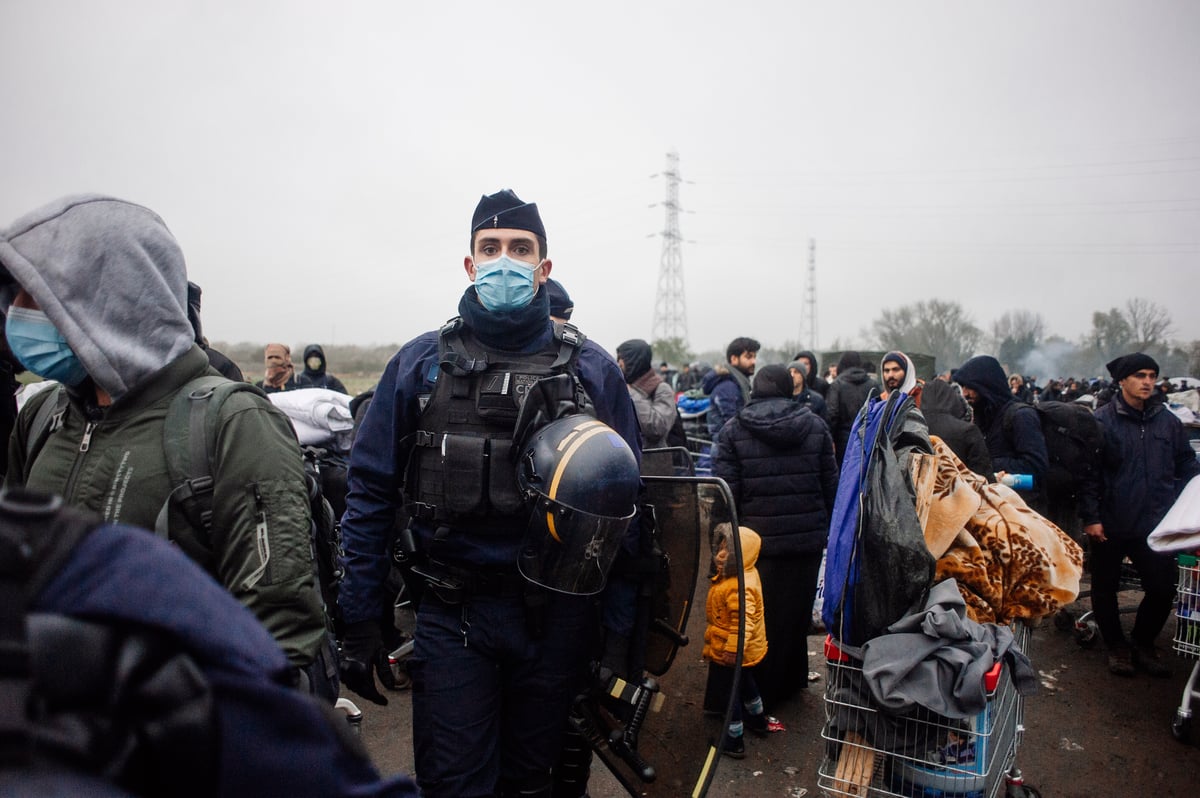French police break up migrant camp near Dunkirk