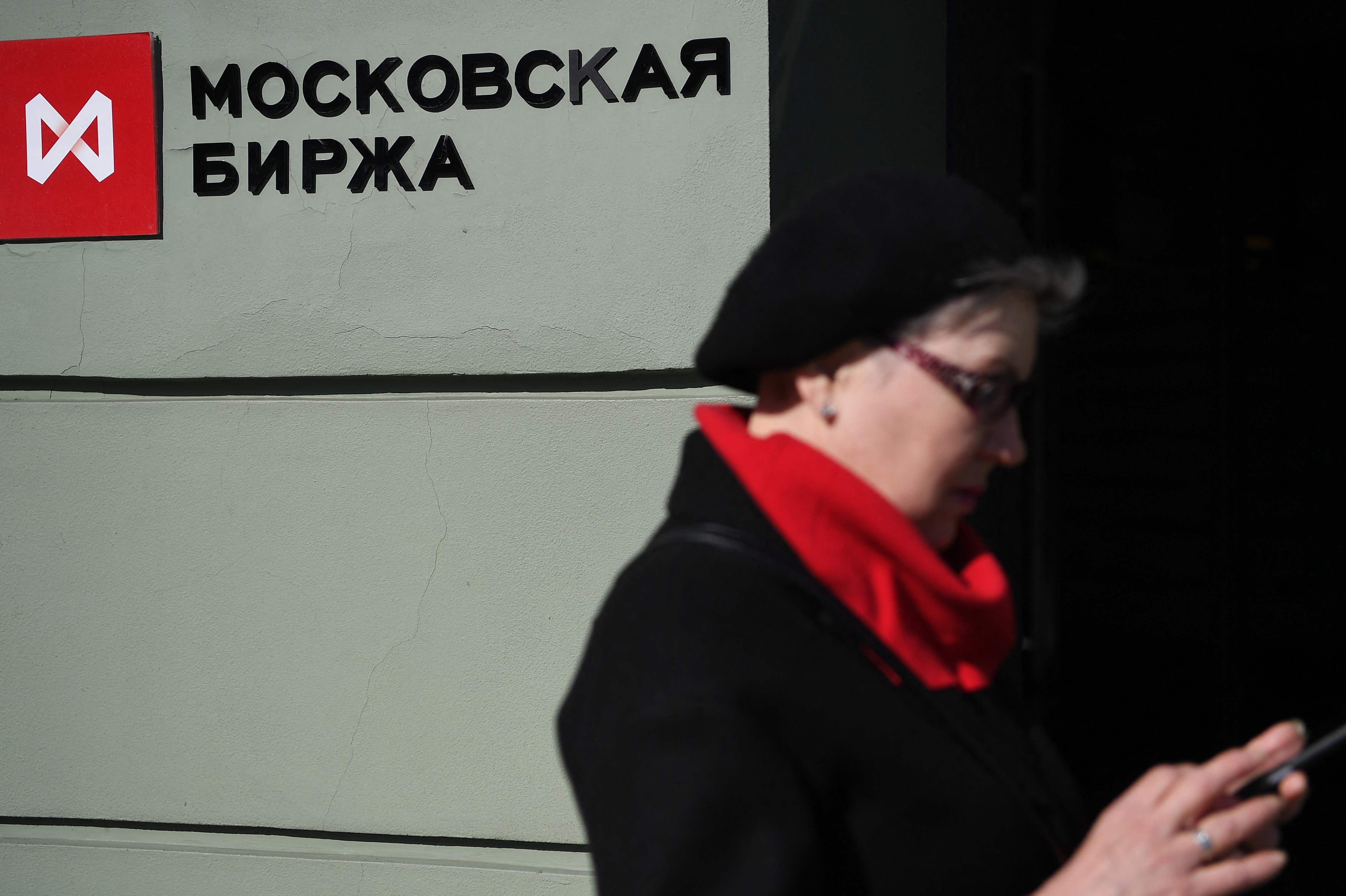 Russian stocks rally as Moscow Stock Exchange partially re-opens
