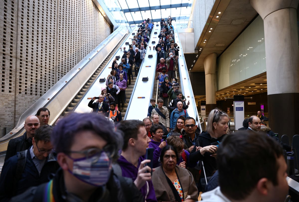 Elizabeth line opening: Thousands queue in rain to get Crossrail party started