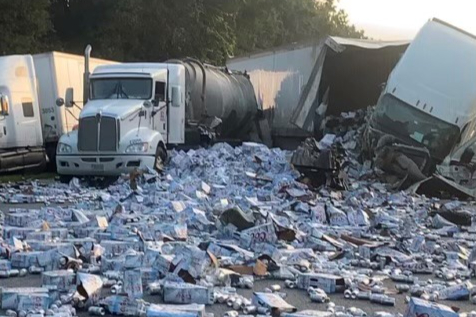 Florida highway blocked on by thousands of Coors Light beer cans after lorry crash