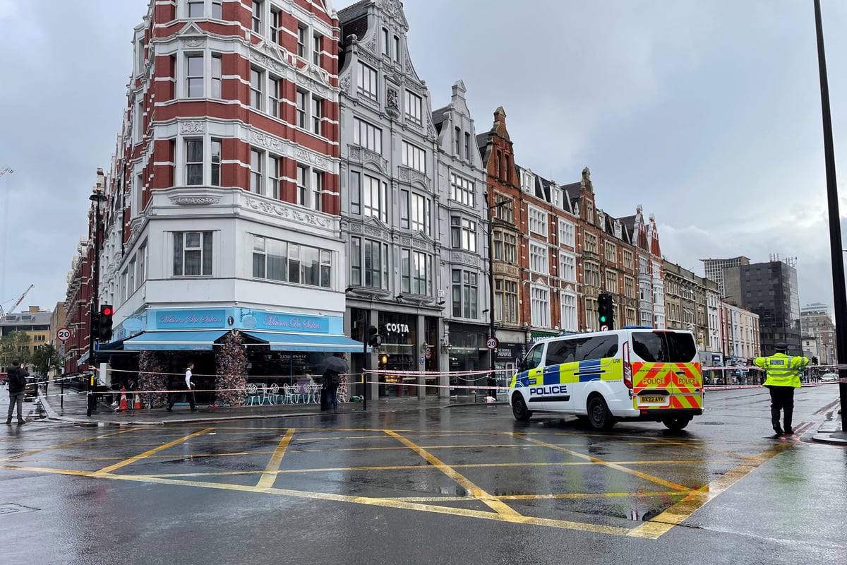 Suspect caught by members of public after woman stabbed in coffee shop