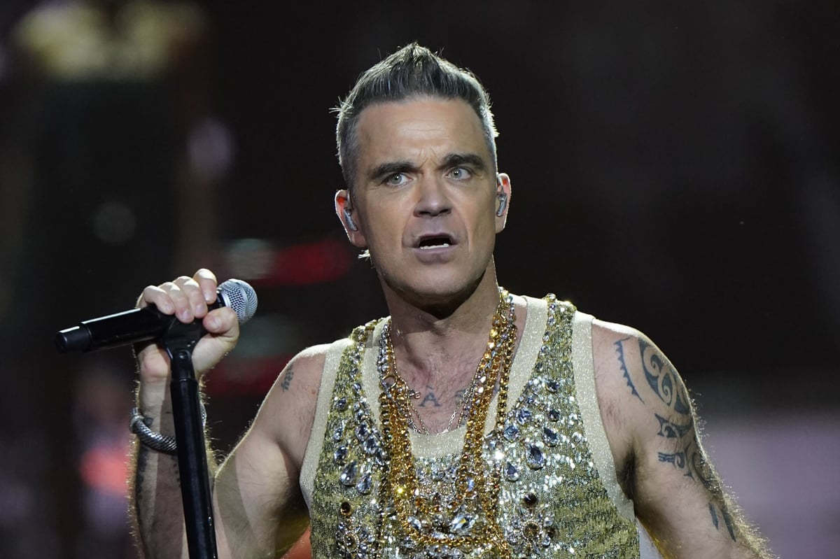 Robbie Williams hires builders using ‘19th-century hand-tools’ to keep noise down during renovation after row with neighbour Jimmy Page over impact of work