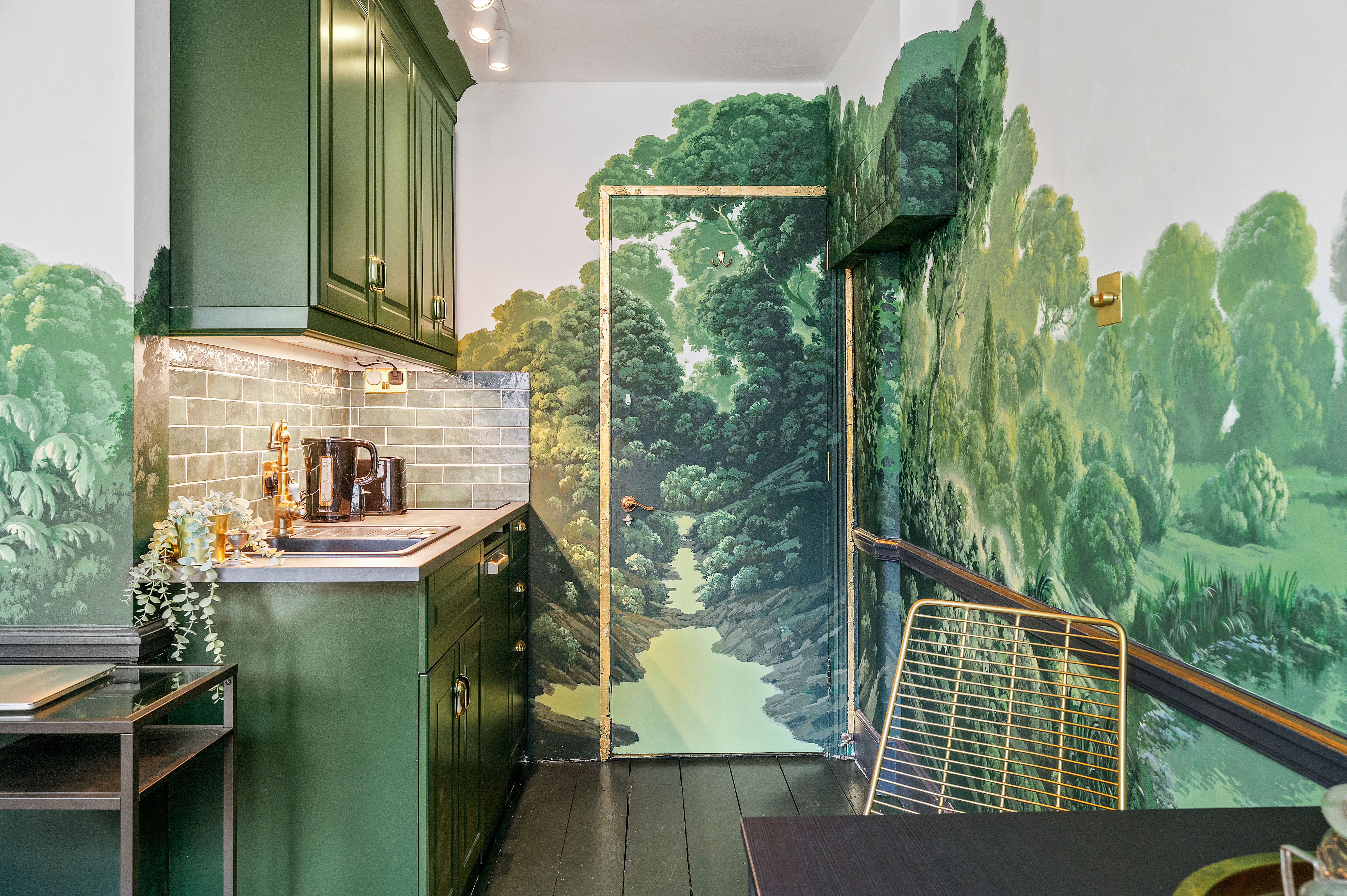 Inside a tiny London studio with a wraparound mural of Clissold Park