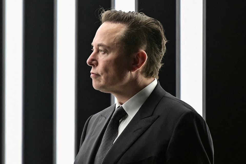 FILE PHOTO: Elon Musk attends the opening ceremony of the new Tesla Gigafactory for electric cars in Gruenheide, Germany, March 22, 2022. Patrick Pleul/Pool via REUTERS/File Photo
