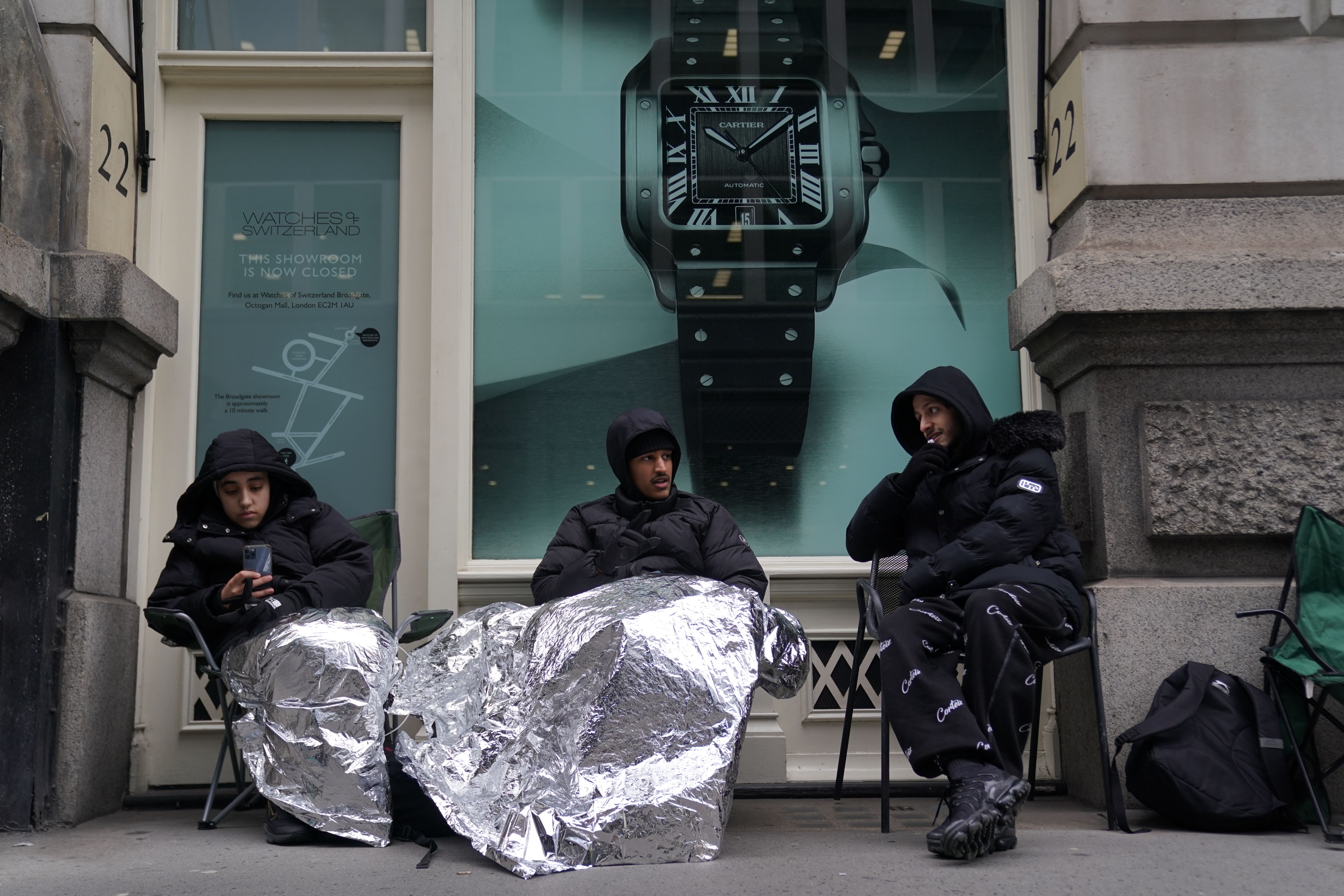 Father and son collectors queue overnight for limited edition watch