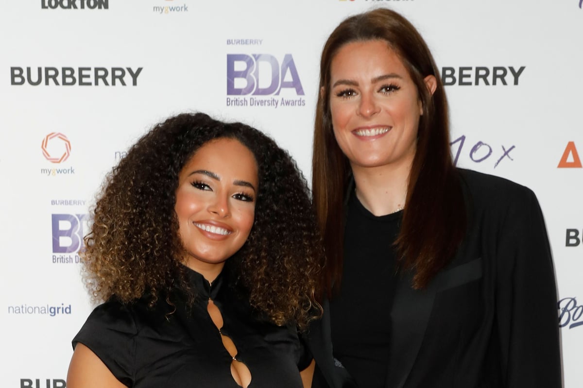 Amber Gill is all smiles beside footballer girlfriend Jen Beattie at British Diversity Awards