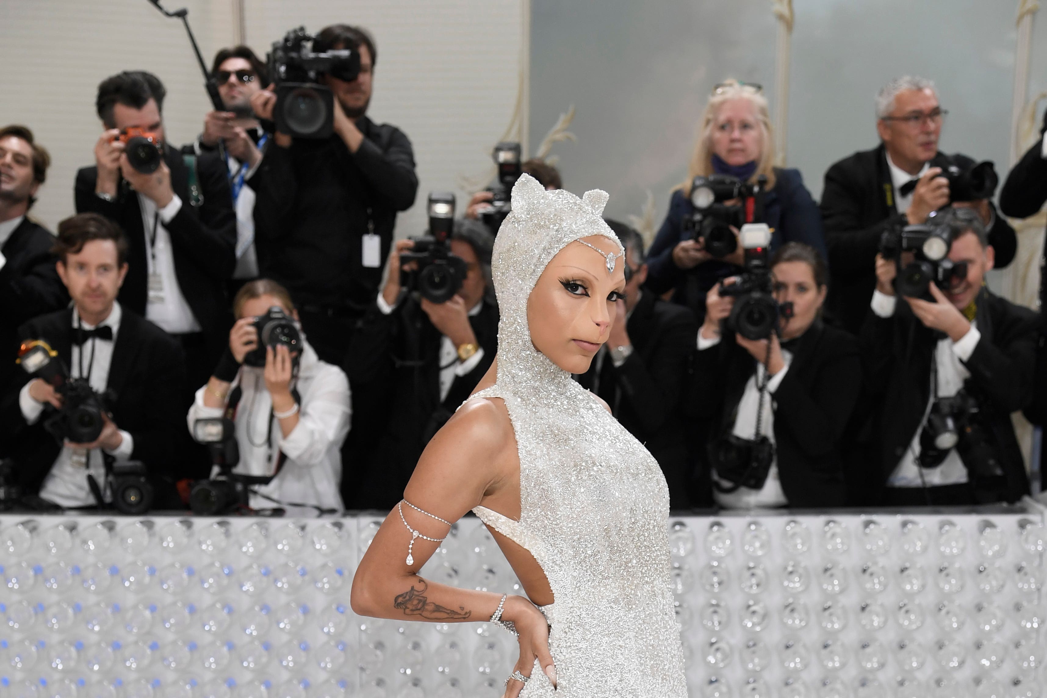 Doja Cat wears feline-inspired prosthetics to first ever Met Gala