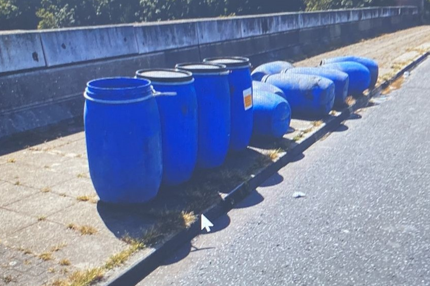 Nearly a dozen barrels of ‘toxic acid’ dumped by side of east London road