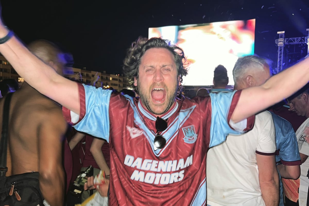 West Ham fan parties with players outside hotel to celebrate club’s victory