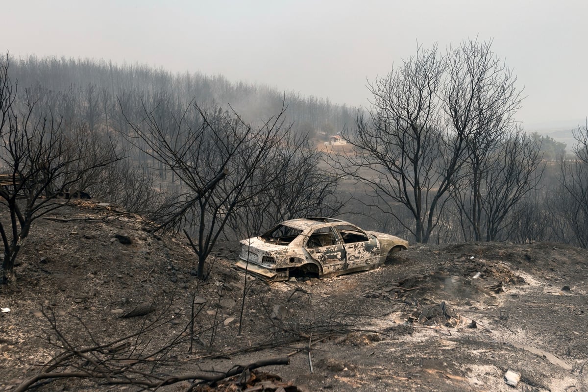 18 people found dead in area devastated by wildfire in Greece