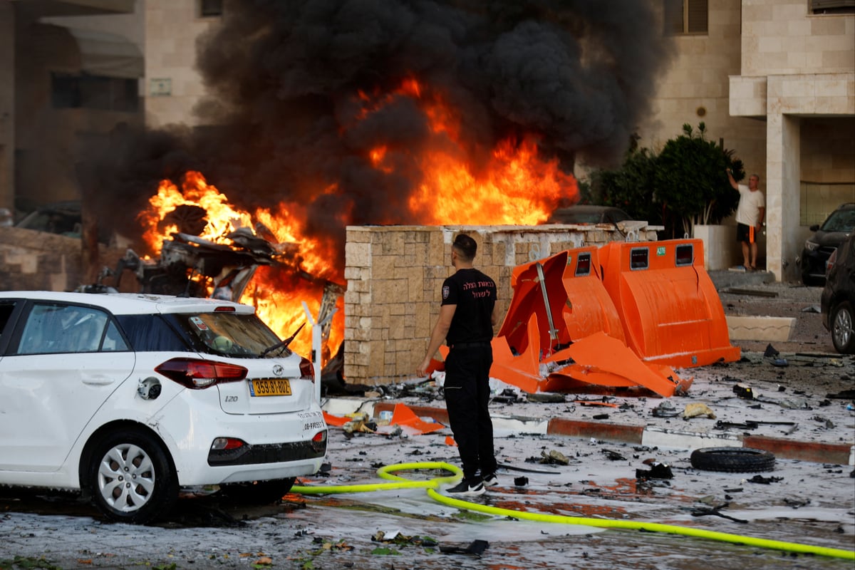 Hamas launches large scale missile strikes into Israel as fighters infiltrate country