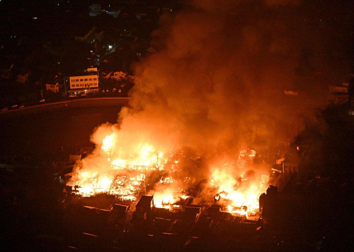Japan earthquake: People trapped in rubble after buildings collapse