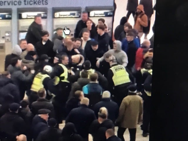 Mass brawl at Waterloo station as thugs battle police