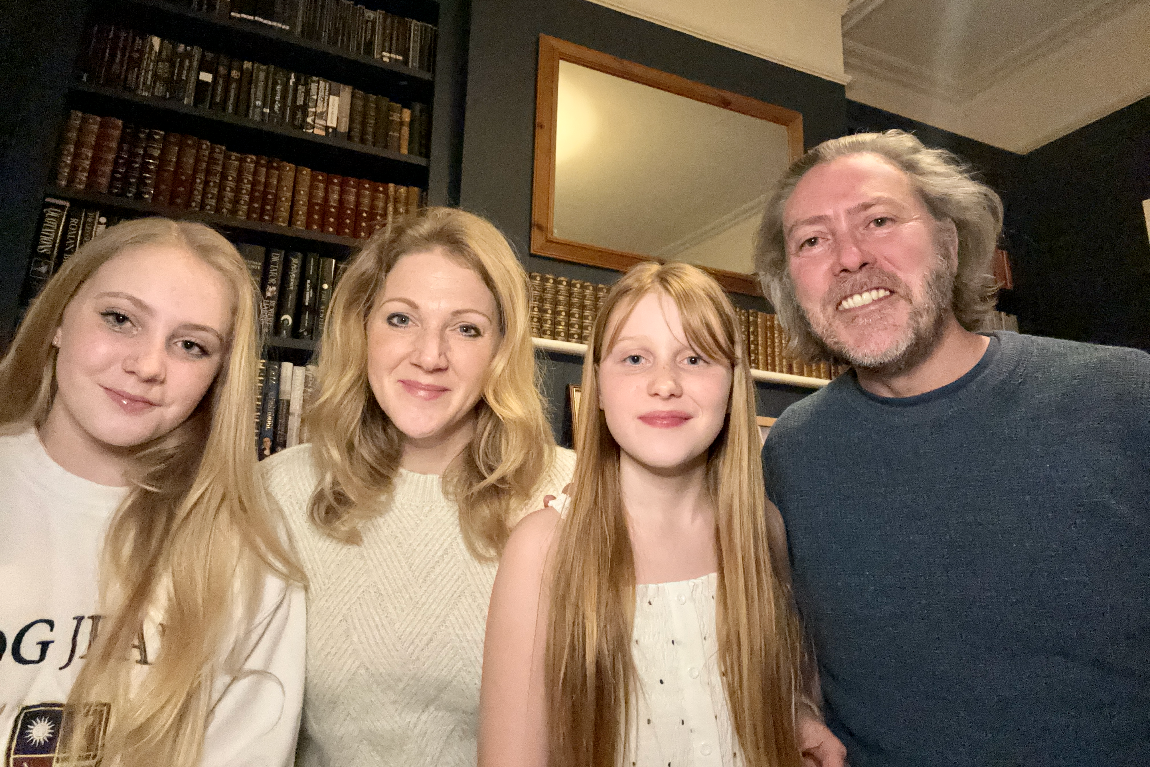 Family brings smiles to faces of those living with cancer through postcards