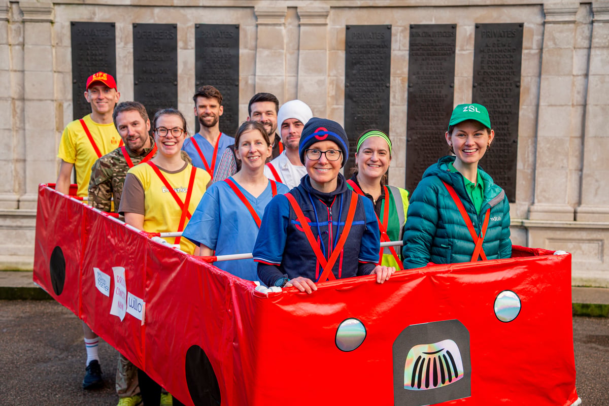 Breast cancer survivor to run London Marathon in 10-person red bus costume