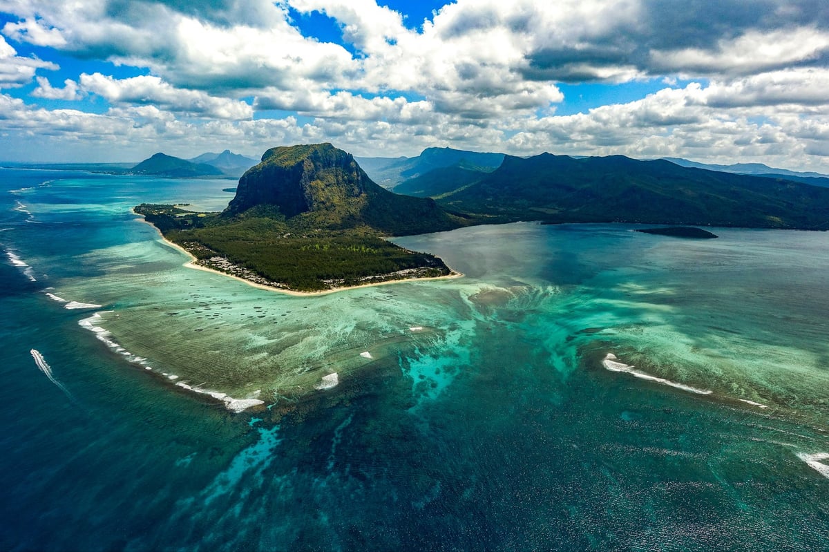 British dad feared dead after being swept to sea while trying to rescue drowning son in Mauritius