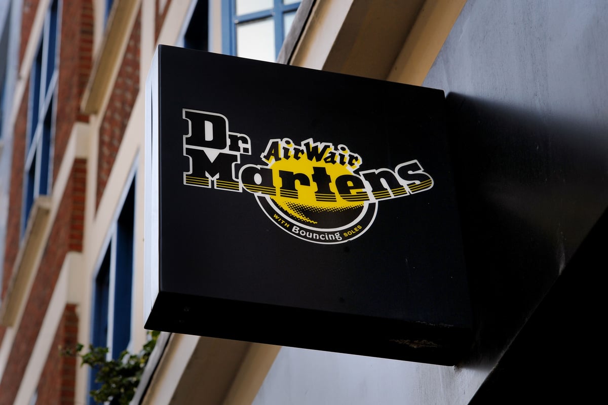 Dr Martens shares dive to record low after profit warning and chief’s exit