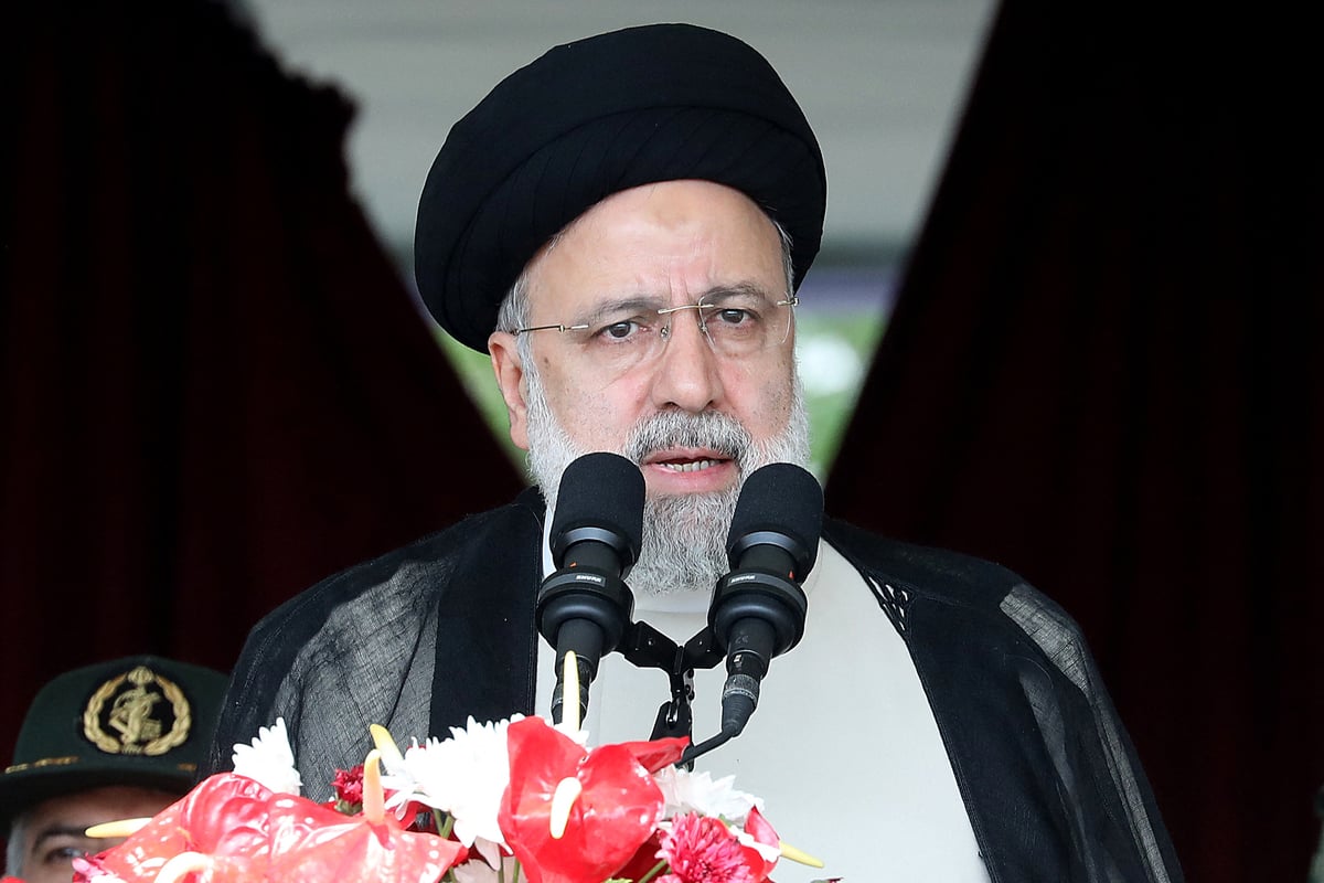 Confusion surrounds search for helicopter carrying Iran's president after 'hard landing' 