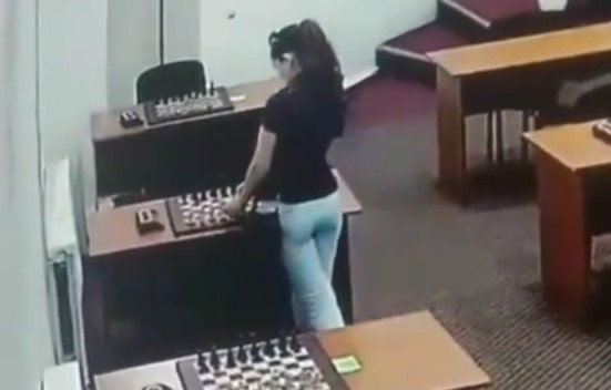 Video allegedly shows Russian chess champion smearing opponent's pieces with mercury to poison her