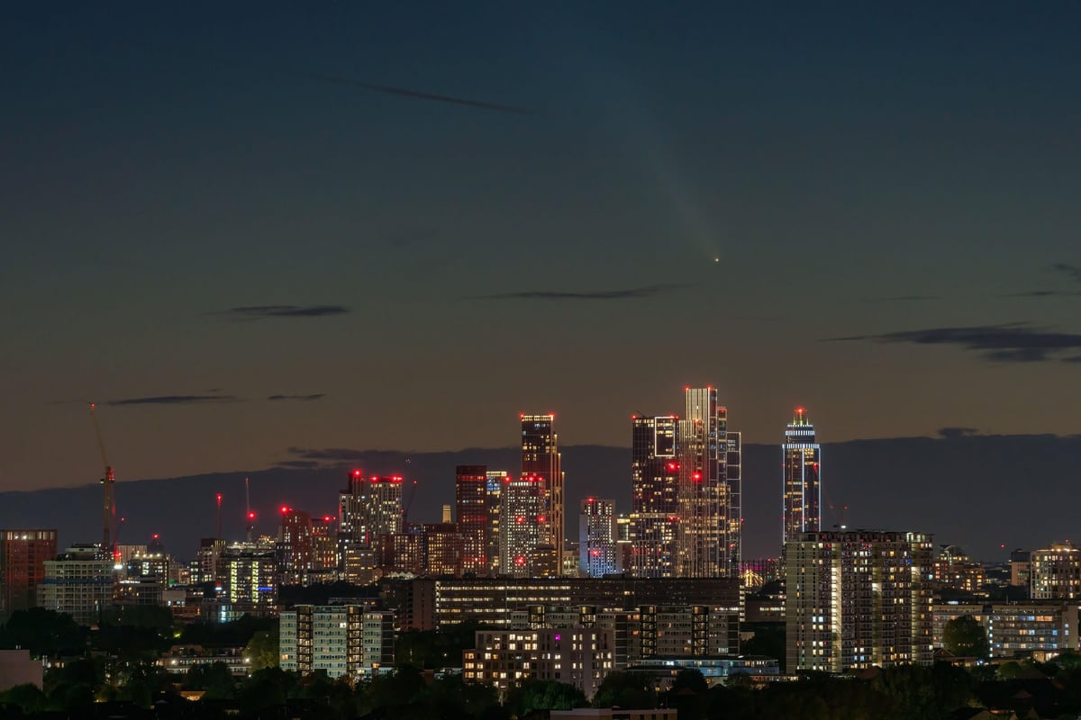 Comet last seen by Neanderthals 80,000 years ago is spotted above London skyline