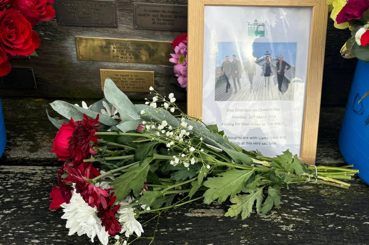 One Direction fans leave flowers on Somerset pier for Liam Payne