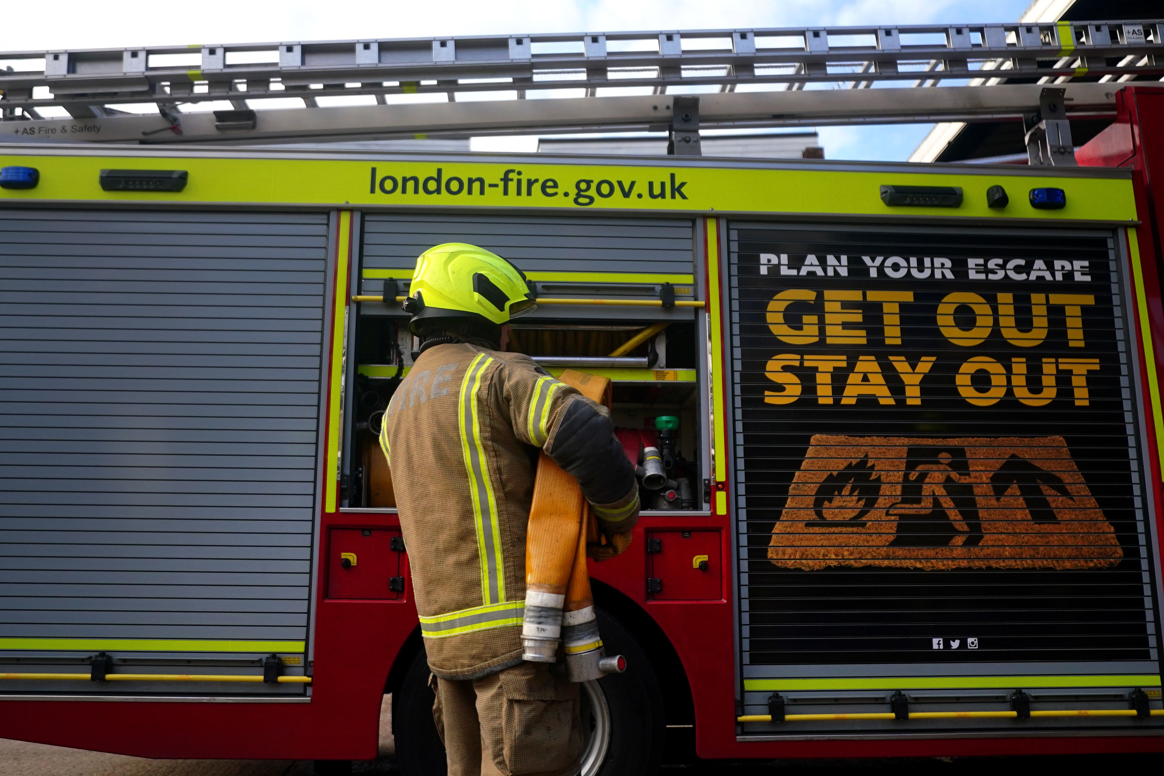 Three people treated for smoke inhalation after fire in east London