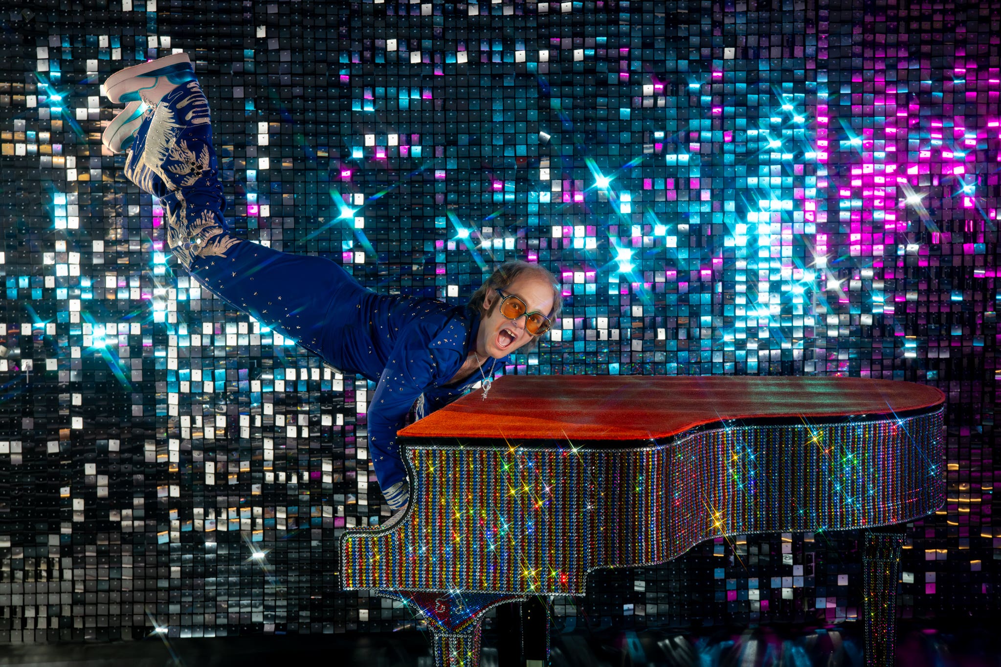 Elton John keyboard handstand waxwork unveiled at Madame Tussauds