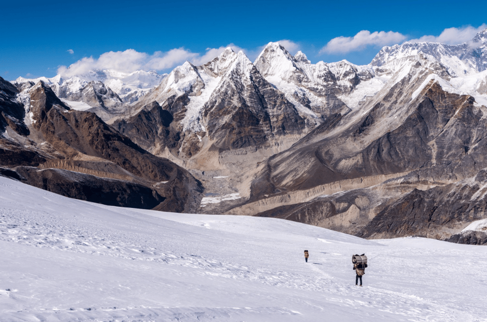 Two porters walking down from the top of Mera peak 