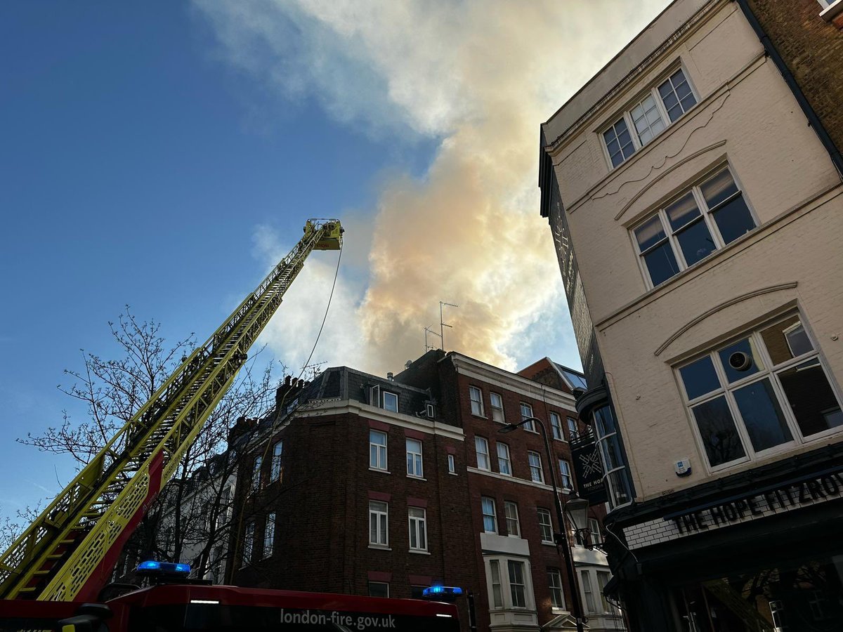 Tottenham Street fire: Man rescued as blaze sends smoke billowing across central London skyline 