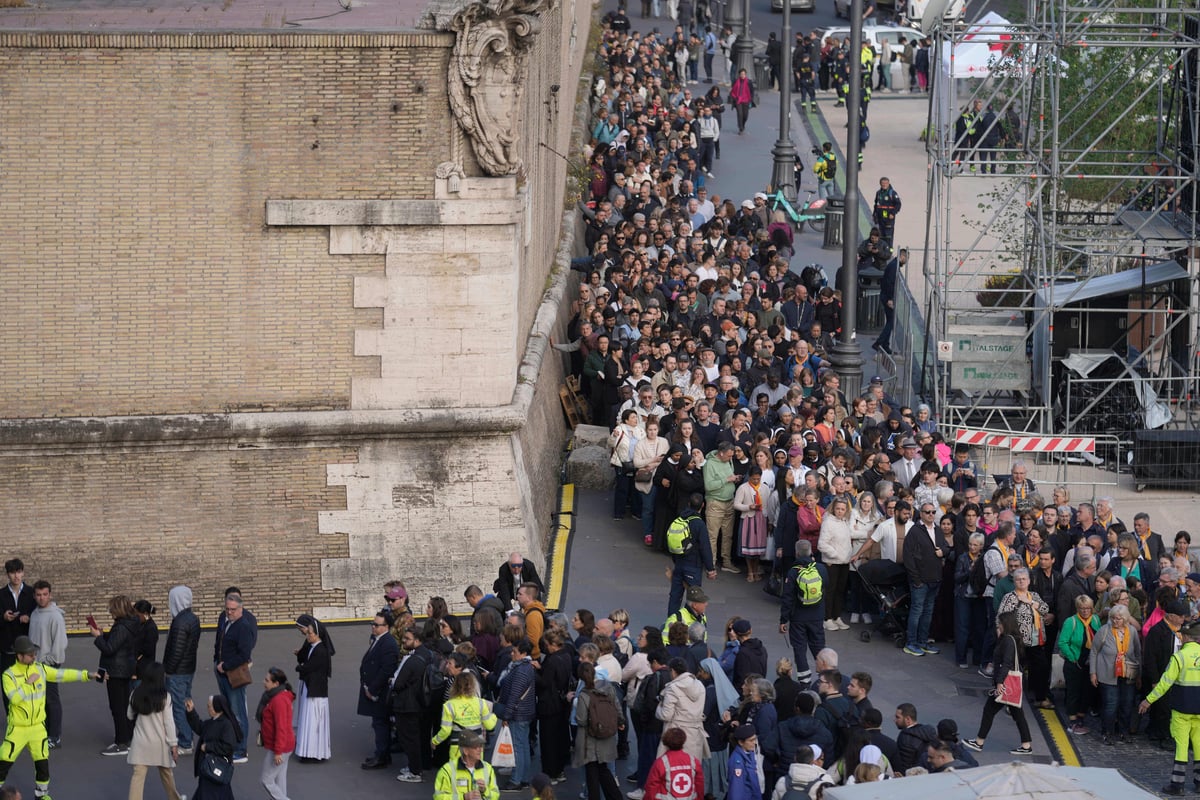 Mourners queue overnight to see popular Pope as Vatican extends opening hours
