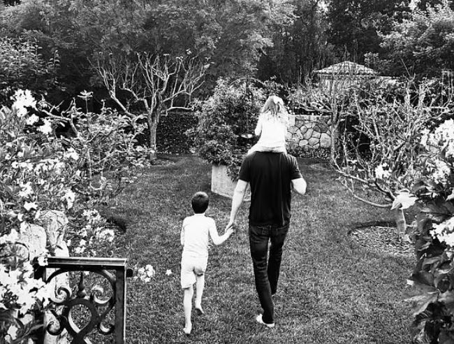 Meghan shares image of Harry with Archie and Lilibet in show of support after royal backlash