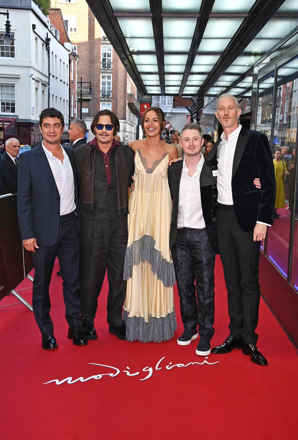 (L to R) Riccardo Scamarcio,  Depp, Antonia Desplat, Ryan McParland and Bruno Gouery attend the UK premiere of Modigliani  Three Days on the Wing of Madness in London
