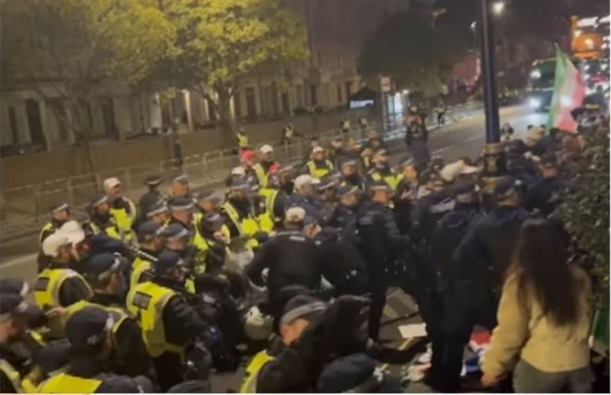Four police officers injured in violent clashes outside Iranian embassy in London 