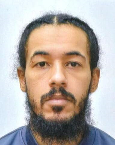 Police offer £10,000 reward as they name suspect in murder manhunt