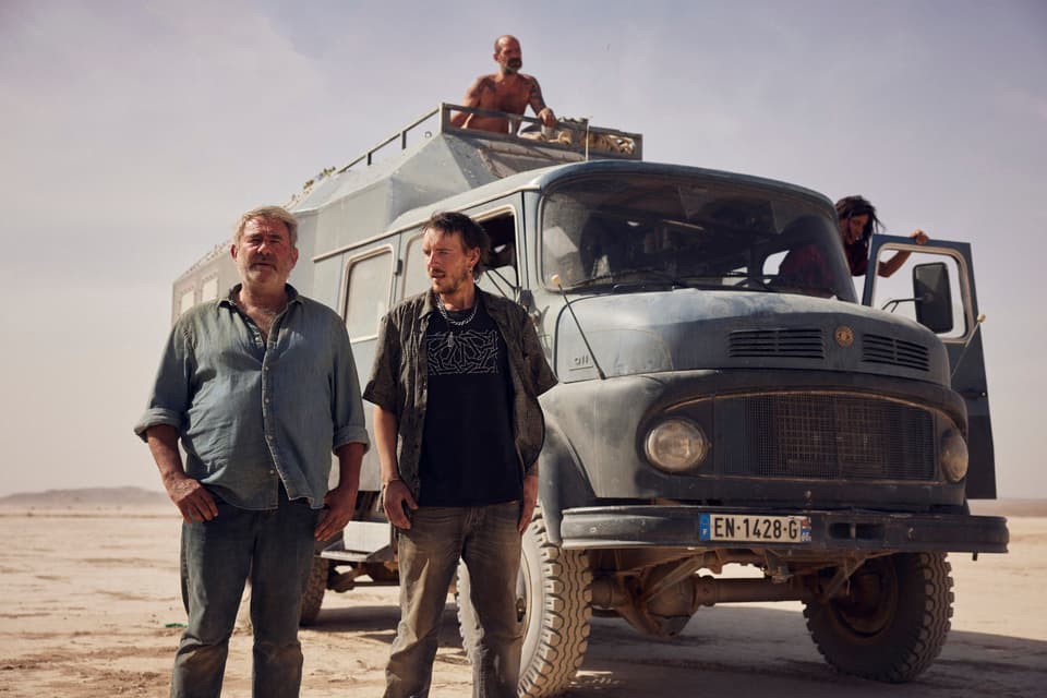 Sergi López, Joshua Liam Henderson and Richard 'Bigui' Bellamy in Sirāt  