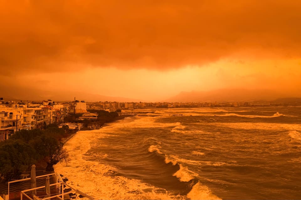 This photograph shows the city of Ierapetra during a dust storm on the Greek island of Crete on April 1, 2026. (Photo by Eleftherios Elis / AFP via Getty Images)
