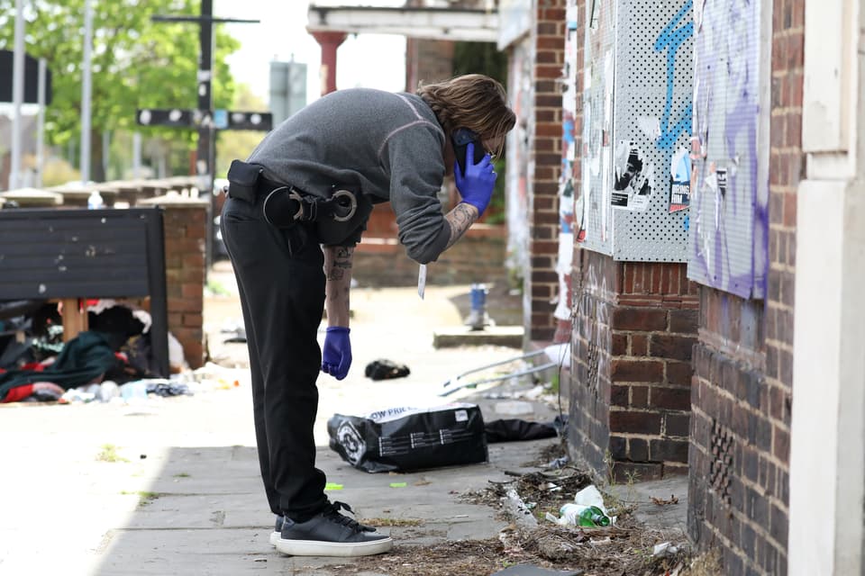 <p>HENDON, ENGLAND - APRIL 18: Police investigate the scene of an attempted arson attack on April 18, 2026 in the Hendon area of London, England. The Metropolitan Police said its officers were called to the location around 10:30pm last night after a man approached a row of shops carrying a bag with three bottles of fluid and tried to set them alight, before fleeing the scene. (Photo by Alishia Abodunde/Getty Images)</p>