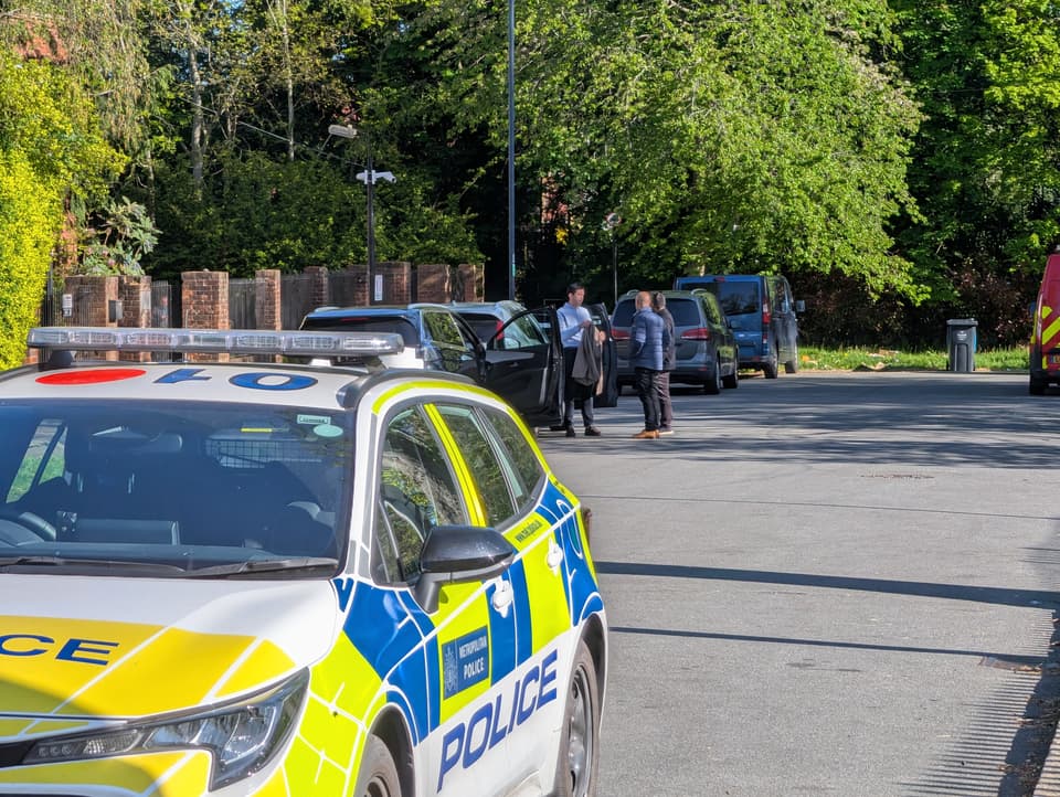 <p>Police officers patrol at a cordon near to an incident at the Kenton United Synagogue in Harrow, north-west London, where an attempted arson attack overnight has caused minor smoke damage to an internal room but no injuries or significant structural damage, the Community Security Trust said. Picture date: Sunday April 19, 2026.</p>