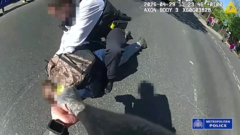 <p>Screen grab from body worn camera issued by Metropolitan Police of police officers confronting and arresting a 45-year-old man who remains in custody, they have said, following two people being stabbed in Golders Green, north-west London. Issue date: Wednesday April 29, 2026.</p>