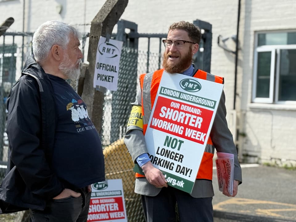 <p>Members of the Rail, Maritime and Transport union (RMT) at the Queen's park depot picket line during the strike action in April</p>