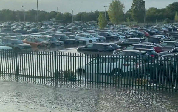 Flash flood swamps hundreds of cars parked at Heathrow Airport 