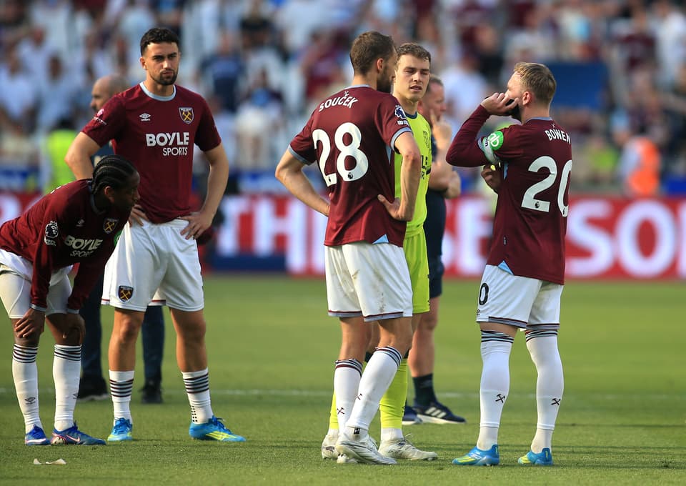 West Ham United players await other results after the final whistle in the Premier League match at the London Stadium. Picture date: Sunday May 24, 2026.