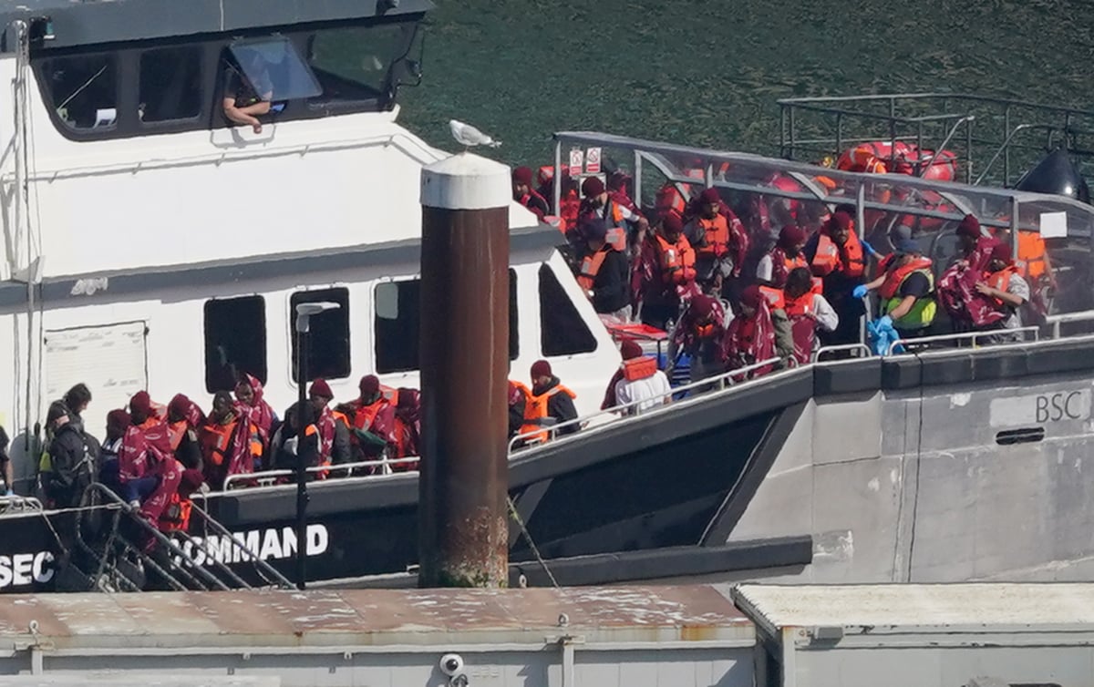 Small boat migrants charged after crossing Channel as over 1,100 make journey during heatwave